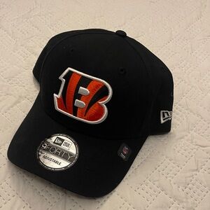 New Era Black Cincinnati Bengals Cap with Orange and White Emblem.